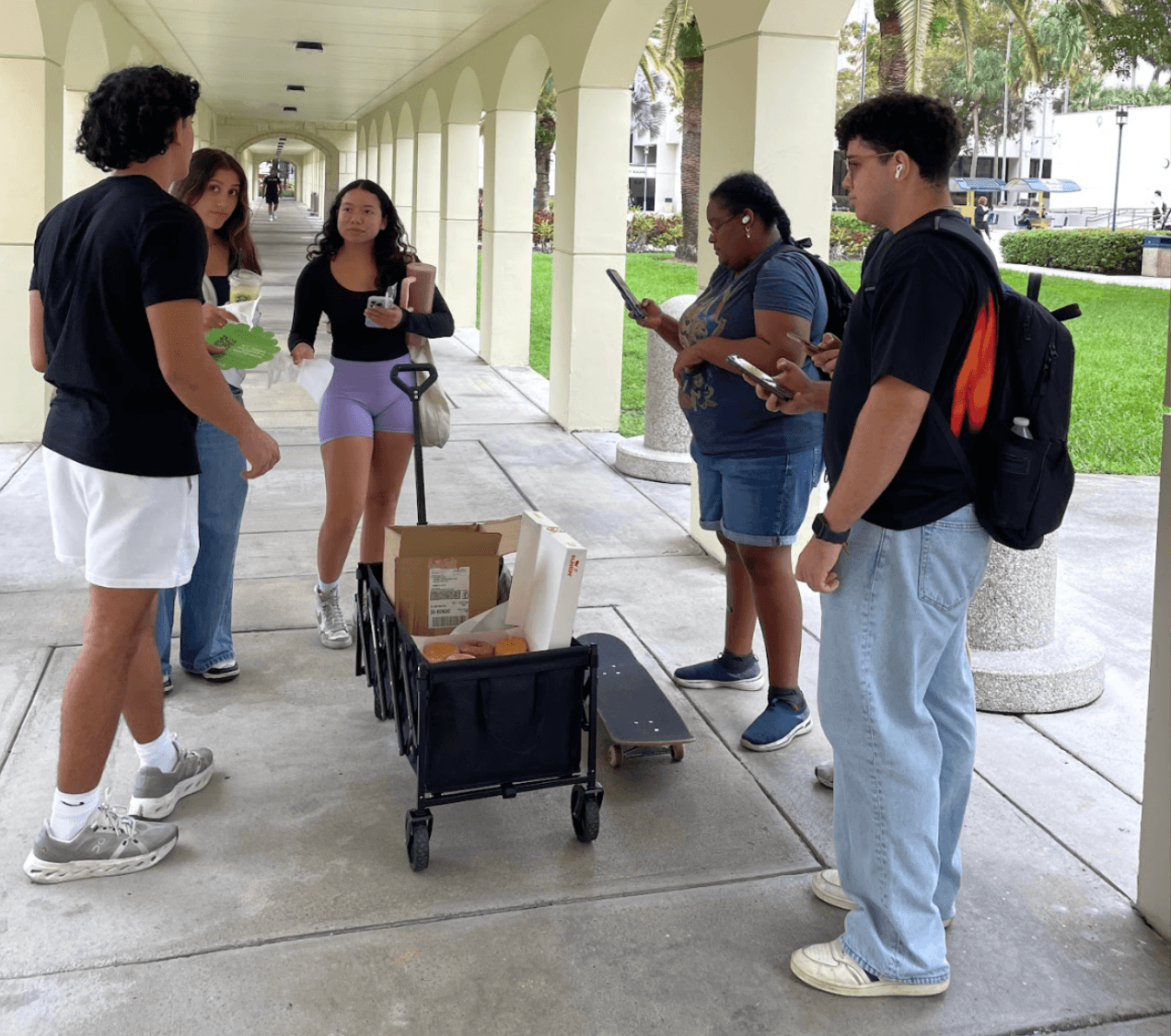 Students running a campus field marketing handout