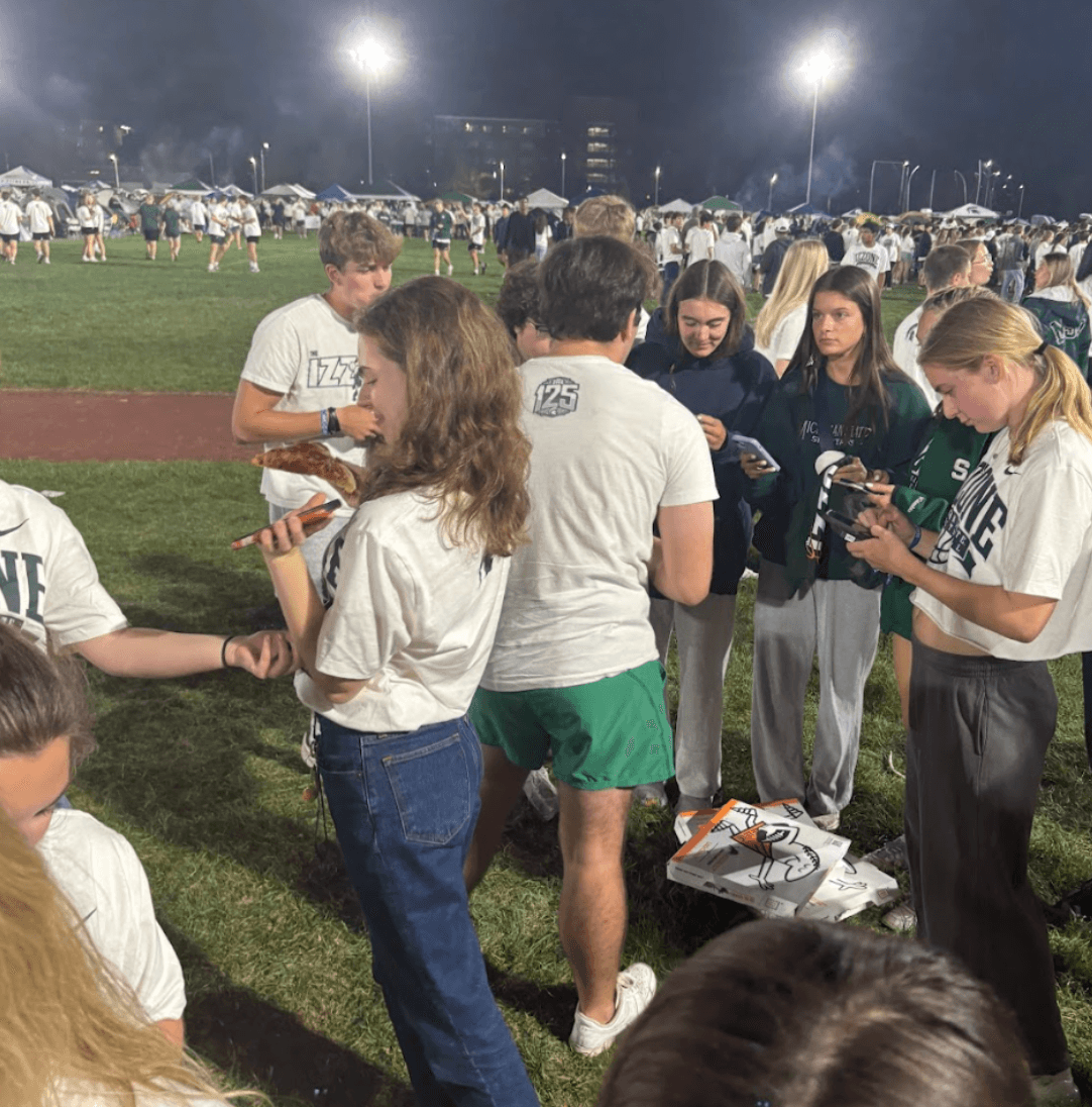Students at a branded campus night event
